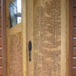 8' tall Carved Butternut door, pine trees