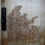 wildflower door carving on curly Maple panel