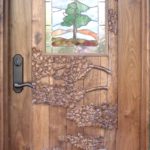 Carved Walnut door with stained glass window