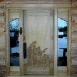 Wildflowers hand carved on curly maple door